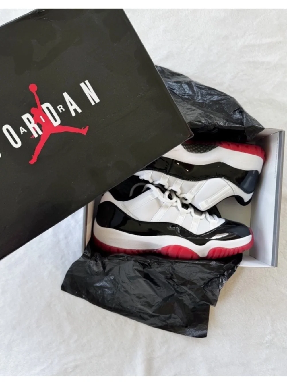 Air Jordan 11 Low Bred Black Red | Men's 8.5